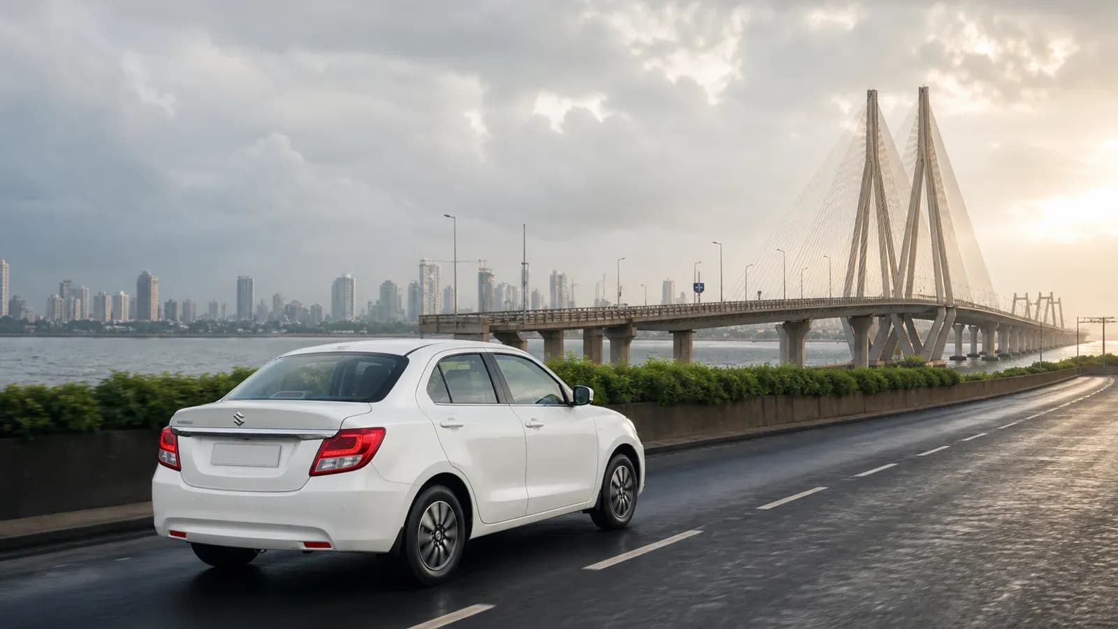 White Maruti Suzuki Dzire approaching Mumbai with the Bandra-Worli Sea Link ahead